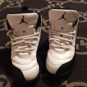 Black and white Nike’s boys 12c